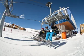 Snowy valley ski lift