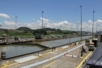 The Panama Canal is an interoceanic navigation route between the Caribbean Sea and the Pacific Ocean that crosses the Isthmus of Panama at its narrowest point, whose length is 82 km..  Ciudad de Panama - Panama