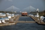 The Panama Canal is an interoceanic navigation route between the Caribbean Sea and the Pacific Ocean that crosses the Isthmus of Panama at its narrowest point, whose length is 82 km..  Ciudad de Panama - Panama