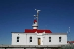 Magdalena Island Lighthouse, Punta Arenas Attractions.  Punta Arenas - CHILE